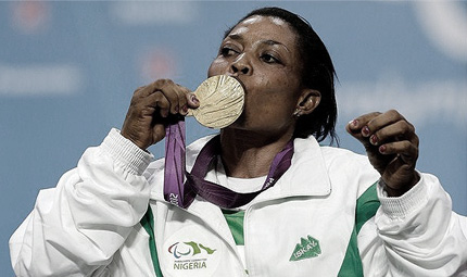 Gold medallist Esther Oyema of Nigeria kisses her medal